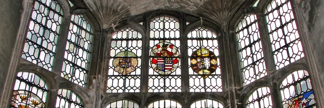 Oriel window in Hengrave Hall — Upper-window banner crop · 1599 × 533